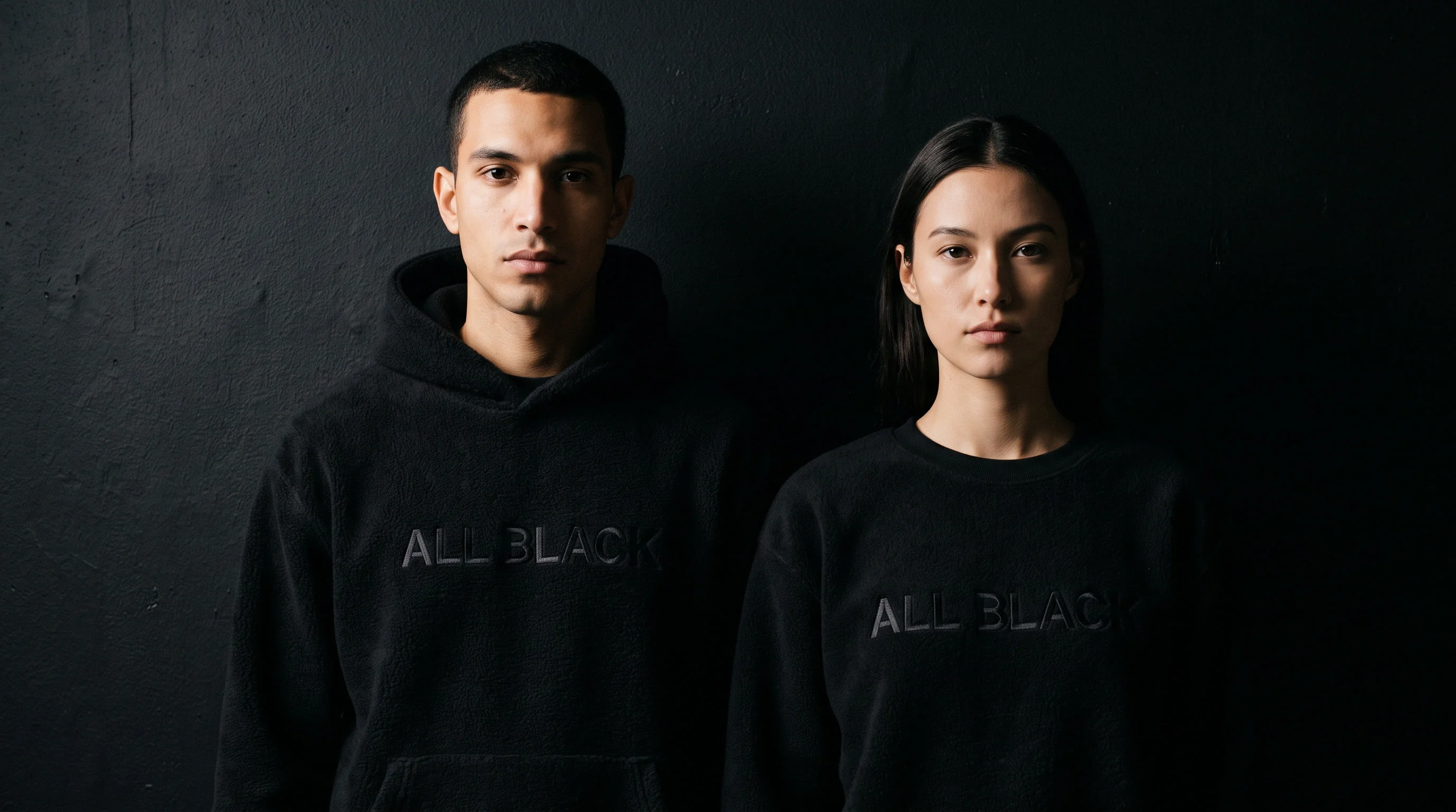Two models in the black hoodie and crewneck